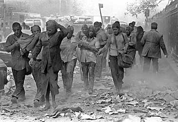 Workers flee covered with ash. (ap/Gulnera Samoilova)